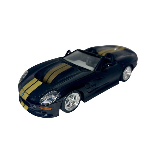 Maisto 1999 Shelby Series 1 Black and Gold Die Cast, 1/18 Scale - Picture 1 of 5